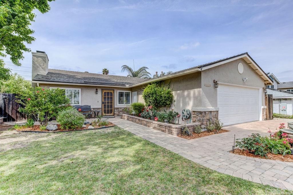 Beautifully landscaped front courtyard with waterfall!
