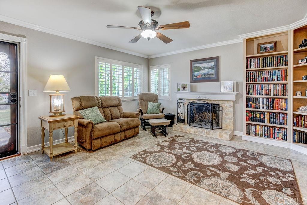 Living room with wood burning fireplace