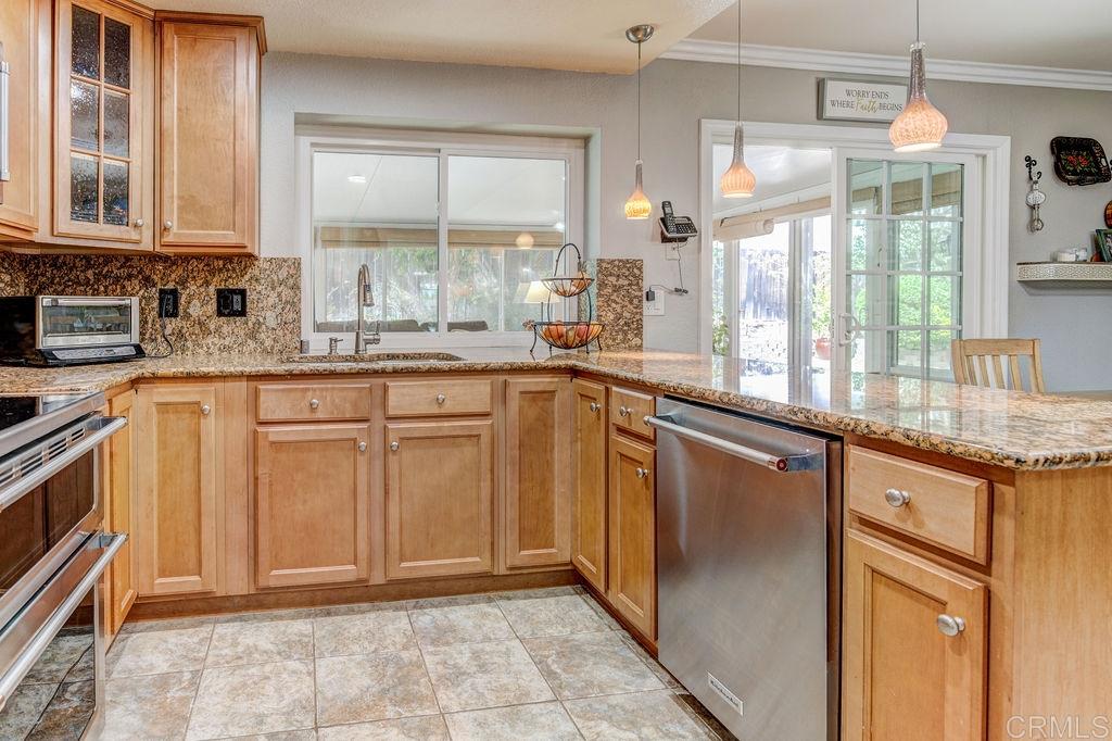 Lots of counter space and charming pendent lights