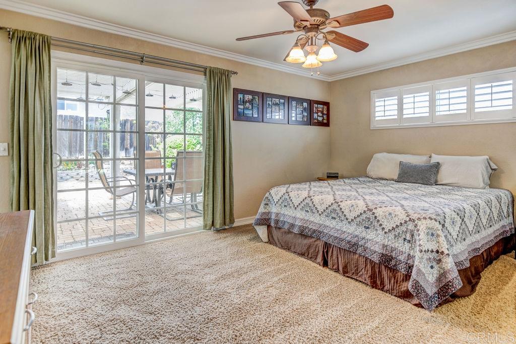 10154 Princess Joann Road Santee, CA 92071 - Photo 8 of 22 Master bedroom with sliding glass door to back patio.