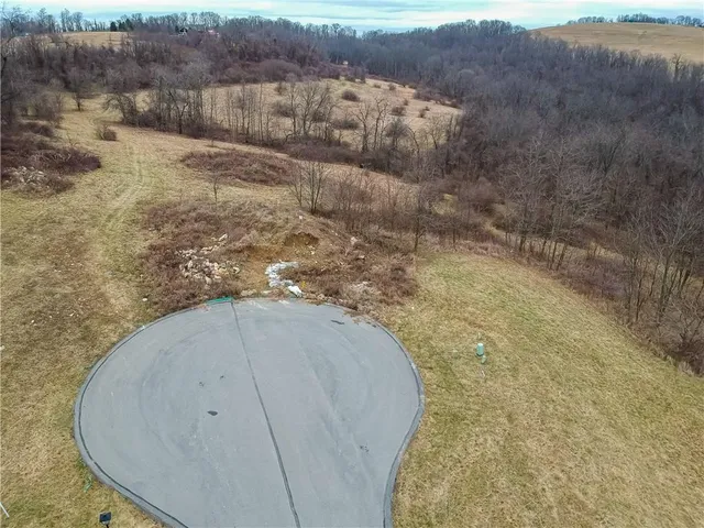 a view of balcony with wooden floor