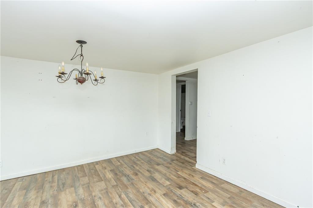 421 Red Mill Road Kittanning, PA 16201 - Photo 11 of 21 a view of a room with wooden floor and chandelier