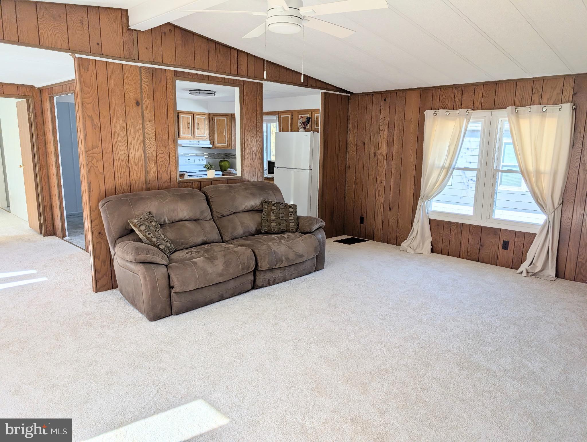 3 Park Lane Easton, MD 21601 - Photo 9 of 34 a living room with furniture and a window