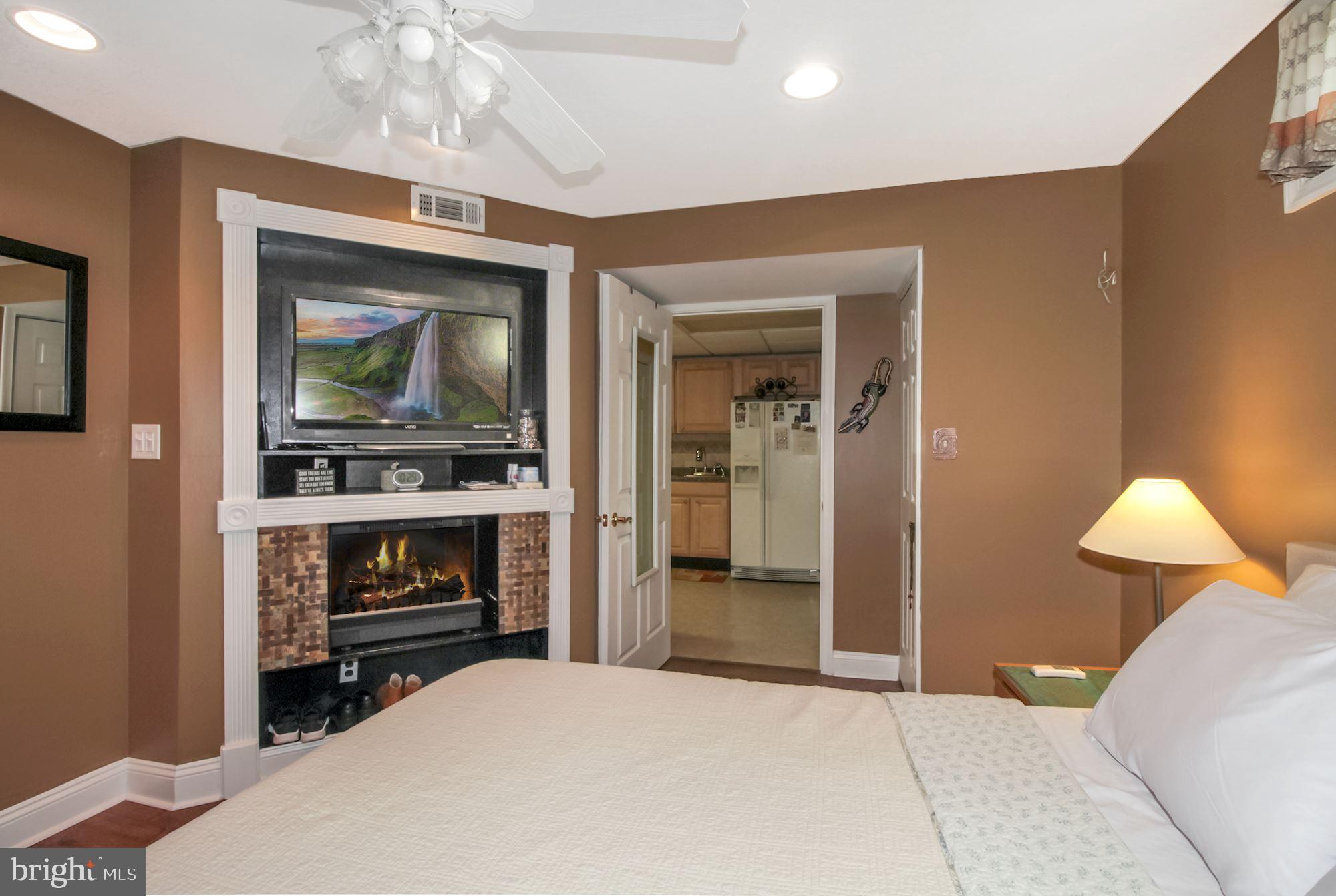 8420 Rocky Mt Road Baltimore, MD 21237 - Photo 22 of 34 Bedroom | Fireplace
