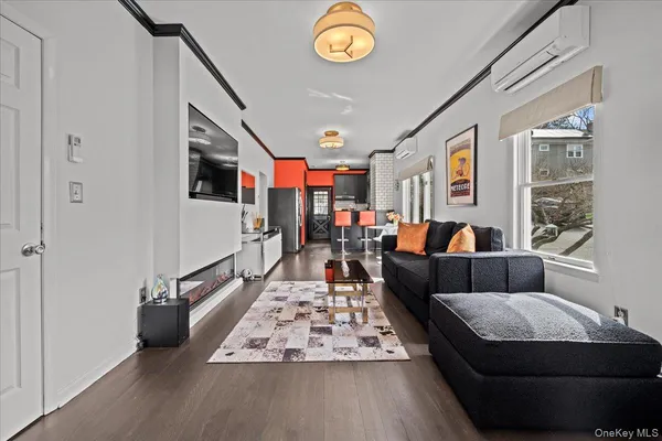 a living room with furniture and a table