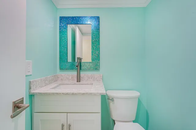 a bathroom with a sink and a toilet
