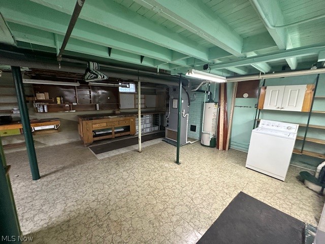 3231 Riverside Avenue Cleveland, OH 44109 - Photo 29 of 37 Basement with washer / dryer, light tile patterned floors, and water heater