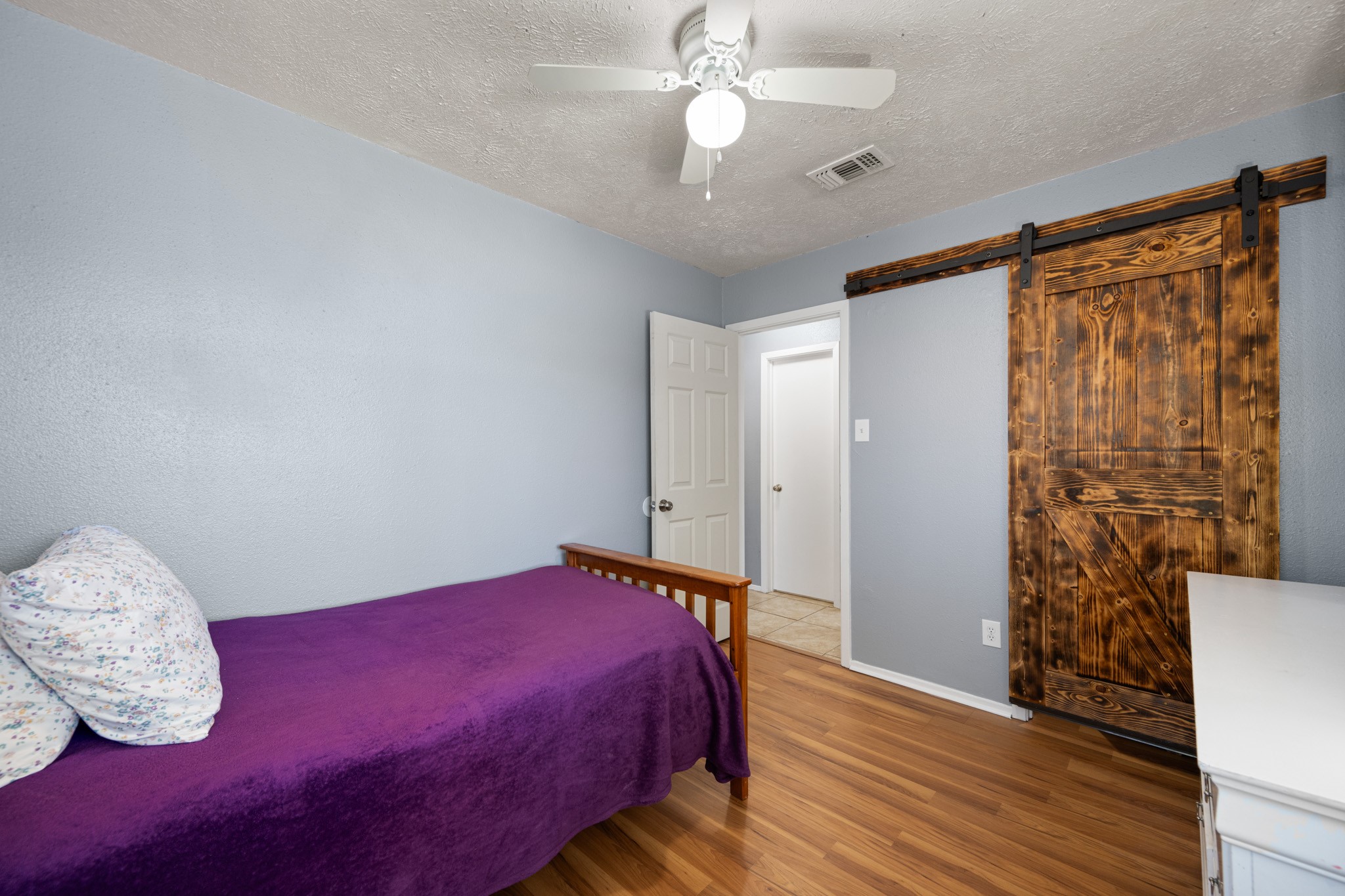 1804 Spruce Drive Rosenberg, TX 77471 - Photo 22 of 29 a bedroom with a bed and a window