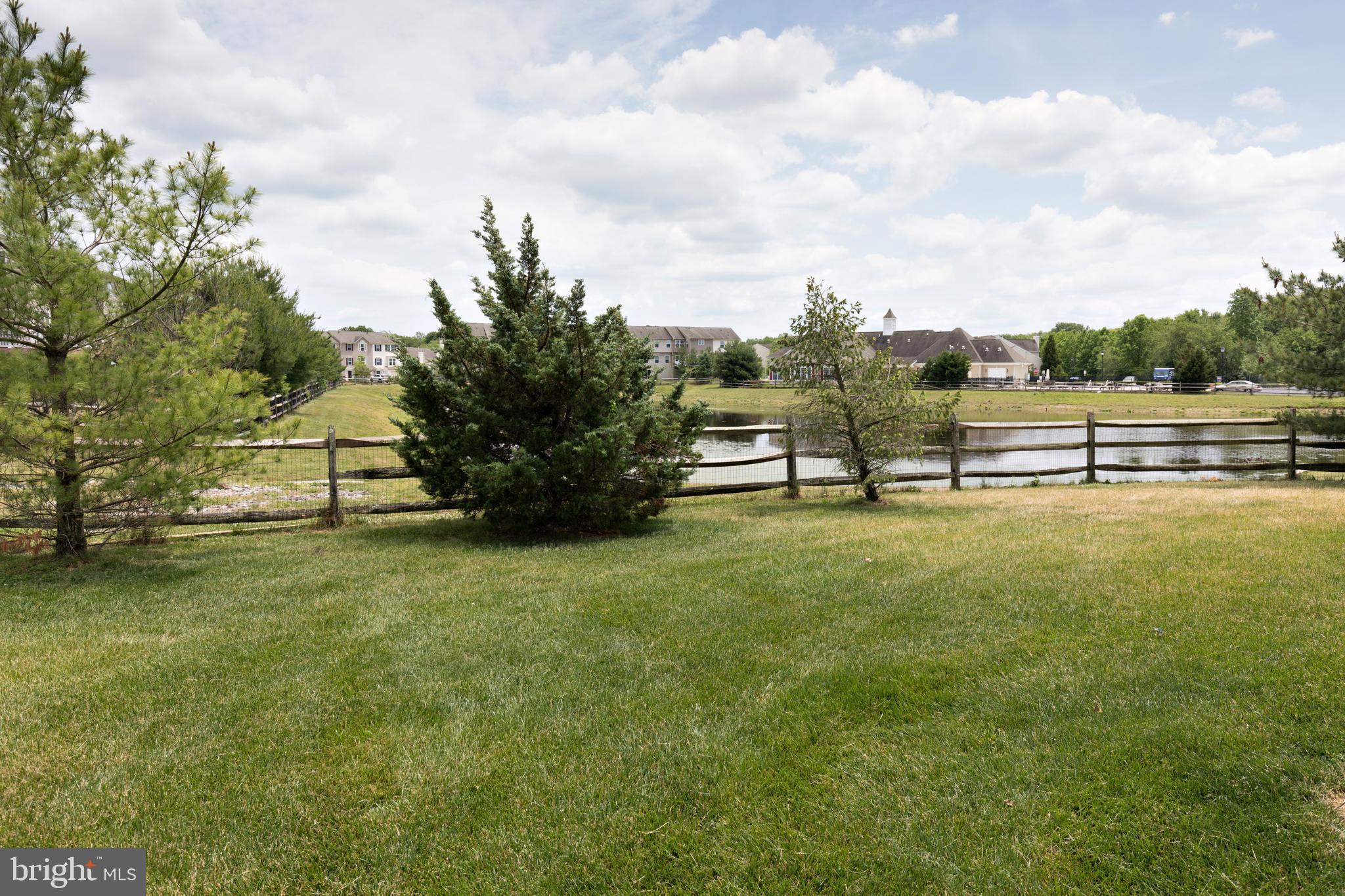 109 Raphael Court Williamstown, NJ 08094 - Photo 22 of 27 Pond in back of unit