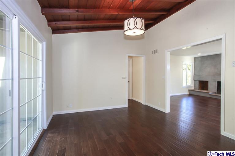 4465 Rising Hill Road Altadena, CA 91001 - Photo 11 of 45 a view of livingroom with furniture wooden floor and window