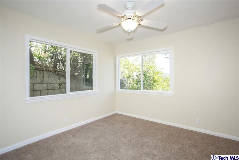 4465 Rising Hill Road Altadena, CA 91001 - Photo 26 of 45 an empty room with a window