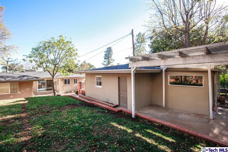 4465 Rising Hill Road Altadena, CA 91001 - Photo 36 of 45 a view of a house with a yard
