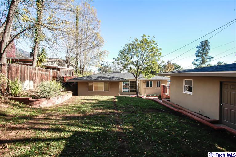 4465 Rising Hill Road Altadena, CA 91001 - Photo 39 of 45 a view of a house with a yard