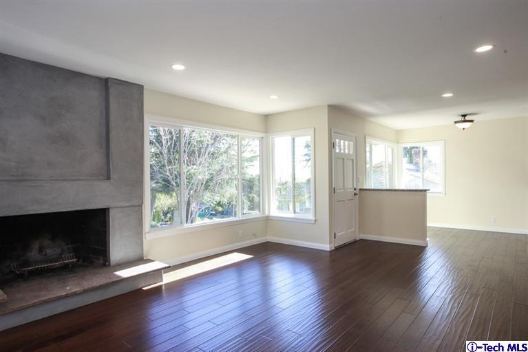 4465 Rising Hill Road Altadena, CA 91001 - Photo 6 of 45 a view of an empty room with wooden floor and a window