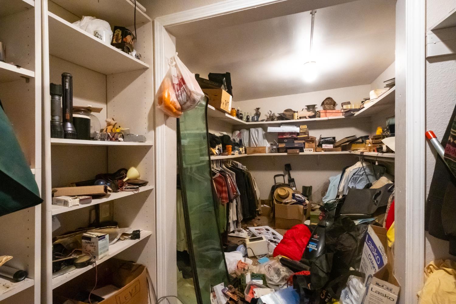 6401 South Chestnut Avenue Fresno, CA 93725 - Photo 16 of 36 a view of walk in closet with clothes and shoes