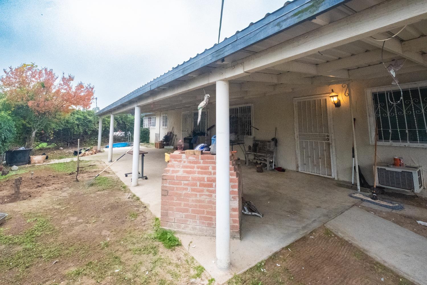 6401 South Chestnut Avenue Fresno, CA 93725 - Photo 19 of 36 a view of a porch with seating space