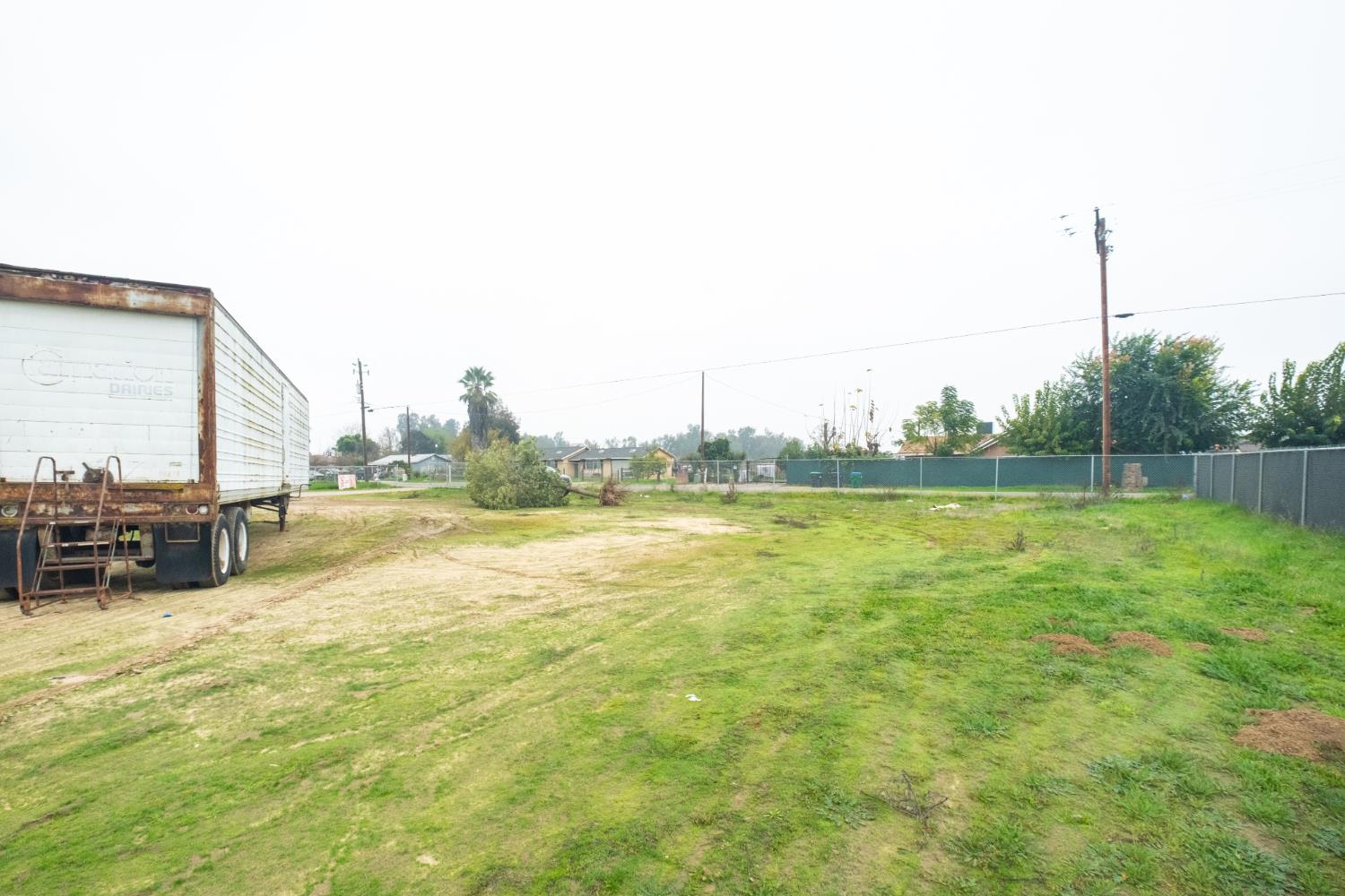 6401 South Chestnut Avenue Fresno, CA 93725 - Photo 26 of 36 a view of a swimming pool with an outdoor seating