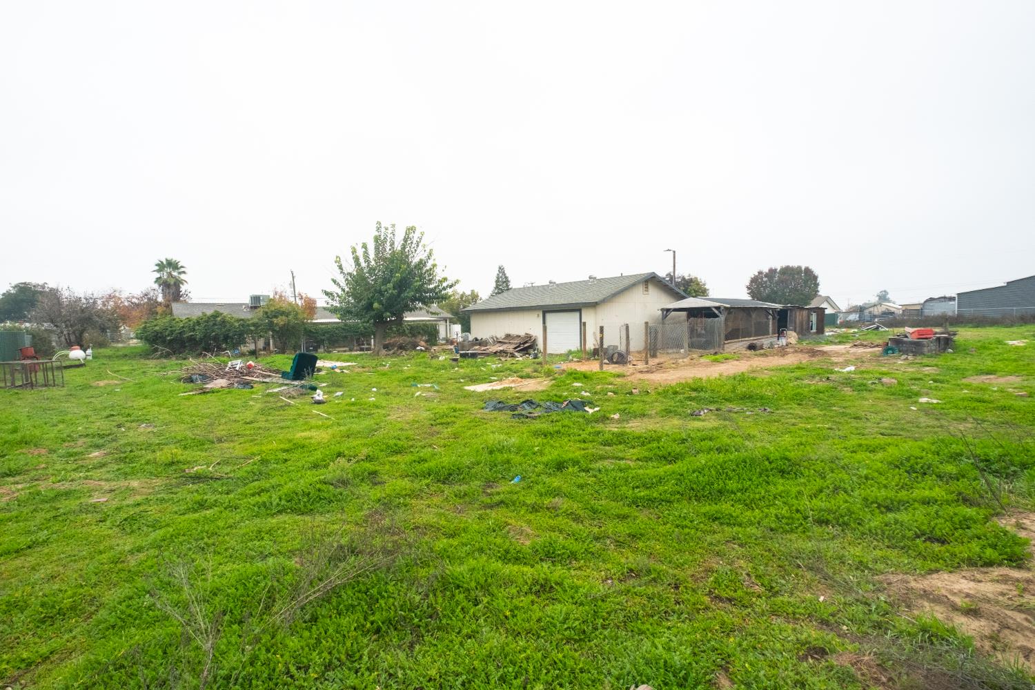 6401 South Chestnut Avenue Fresno, CA 93725 - Photo 29 of 36 a backyard of a house with table and chairs