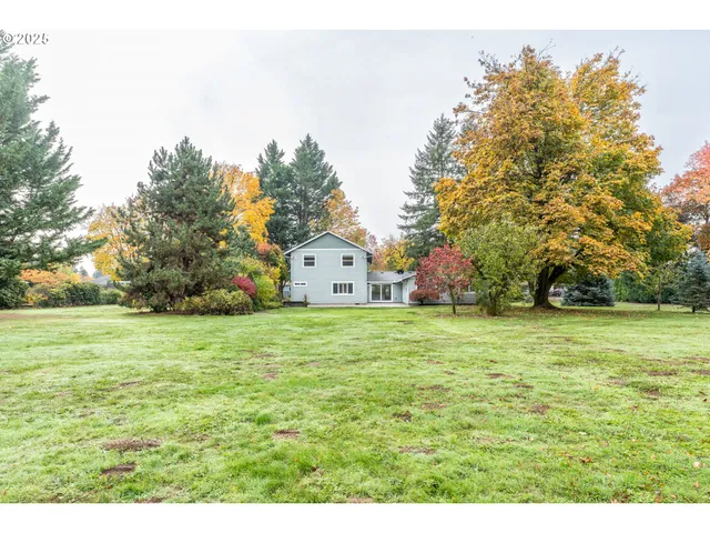 a house with trees in front of it