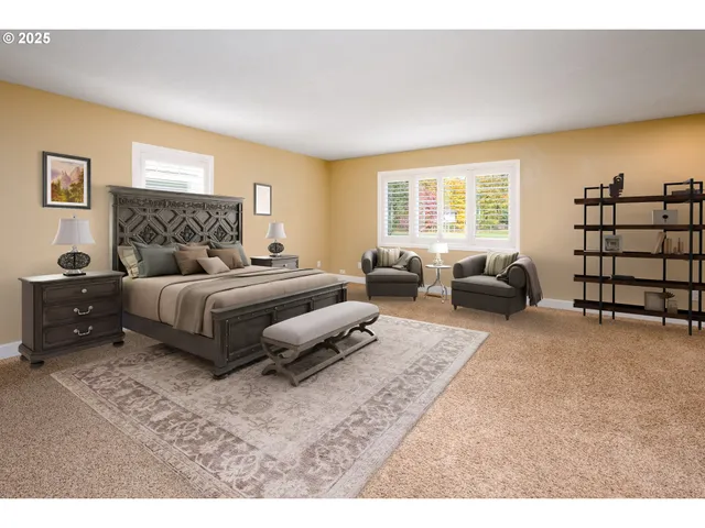 a bedroom with a bed and couch