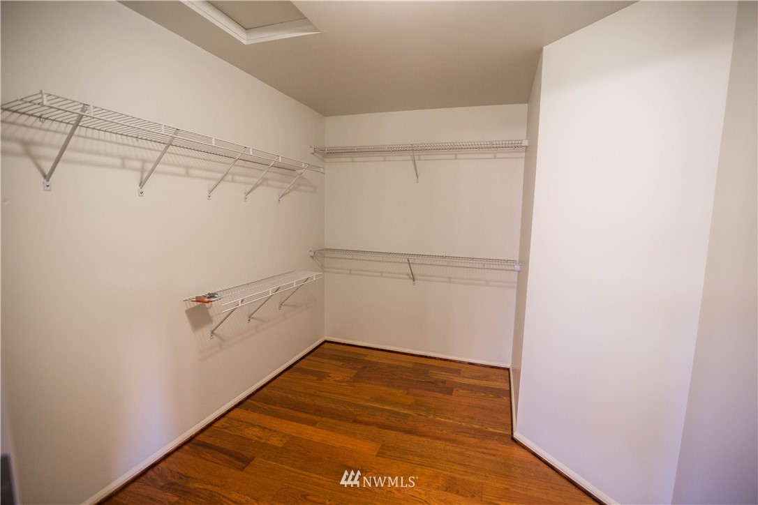 1026 South 36th Place Renton, WA 98055 - Photo 19 of 25 a view of a room with racks on the wall