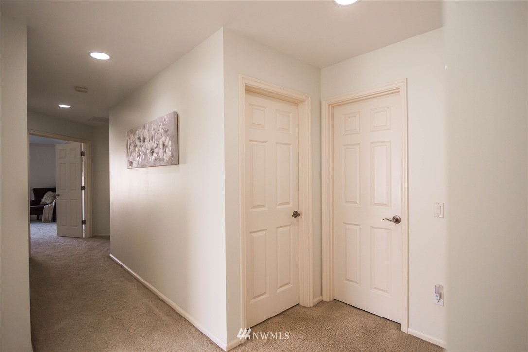 1026 South 36th Place Renton, WA 98055 - Photo 20 of 25 a view of a hallway with closet area