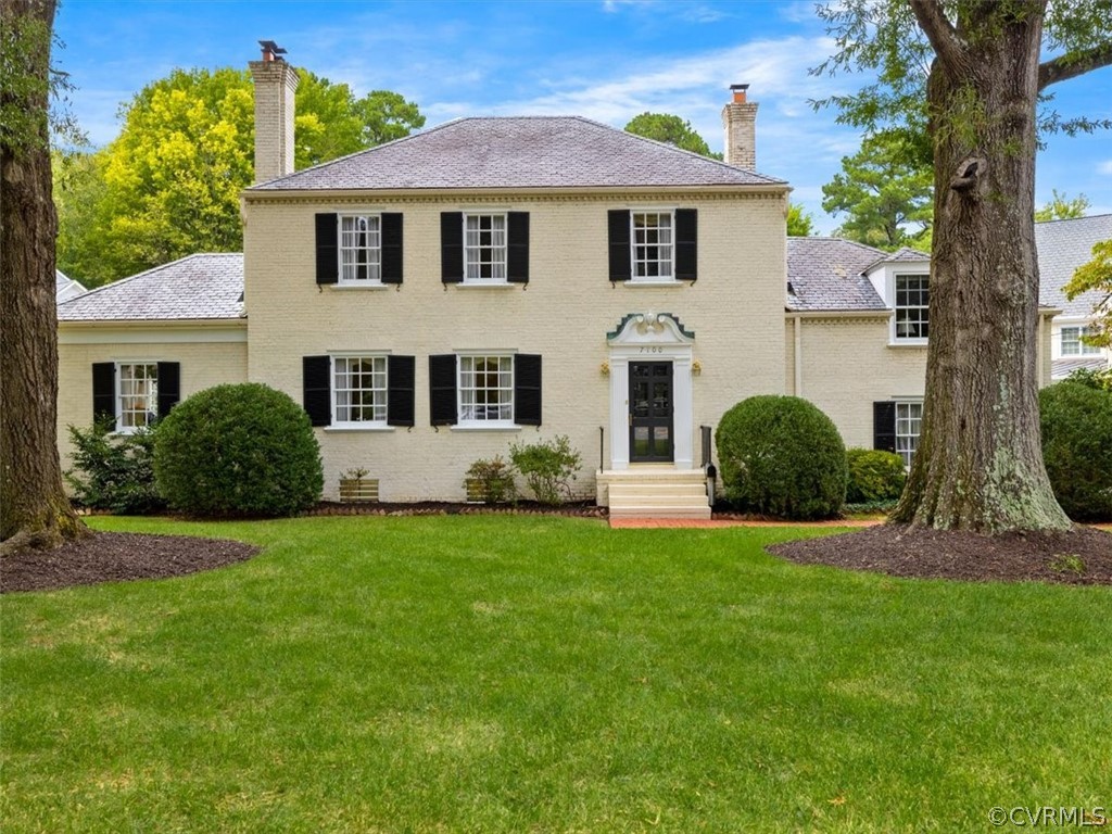 7100 River Road Henrico, VA 23229 - Photo 1 of 32 a front view of a house with a yard