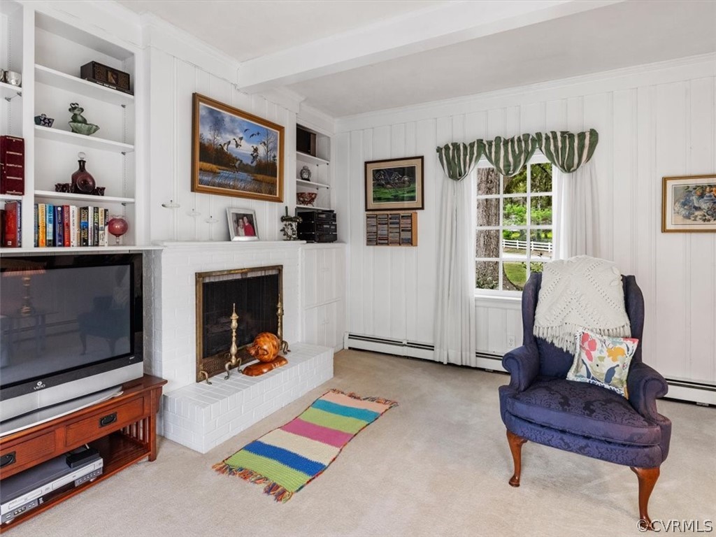 7100 River Road Henrico, VA 23229 - Photo 12 of 32 a living room with furniture and a fireplace