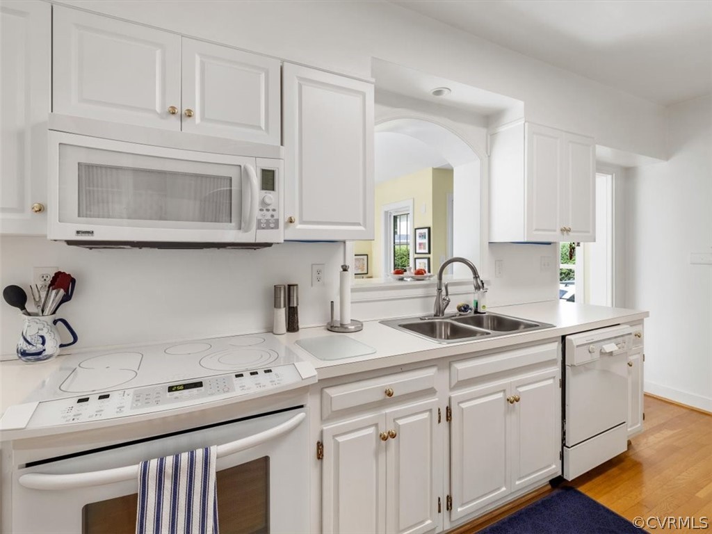 7100 River Road Henrico, VA 23229 - Photo 14 of 32 a kitchen with stainless steel appliances granite countertop a sink a stove and cabinets