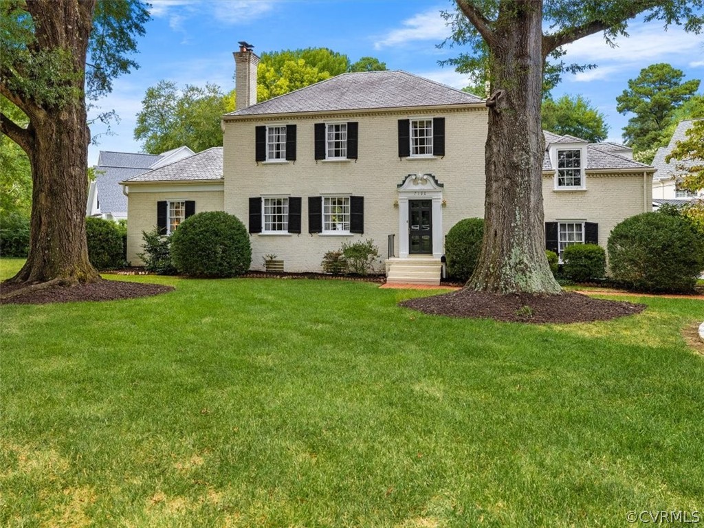 7100 River Road Henrico, VA 23229 - Photo 2 of 32 a front view of a house with a yard and porch