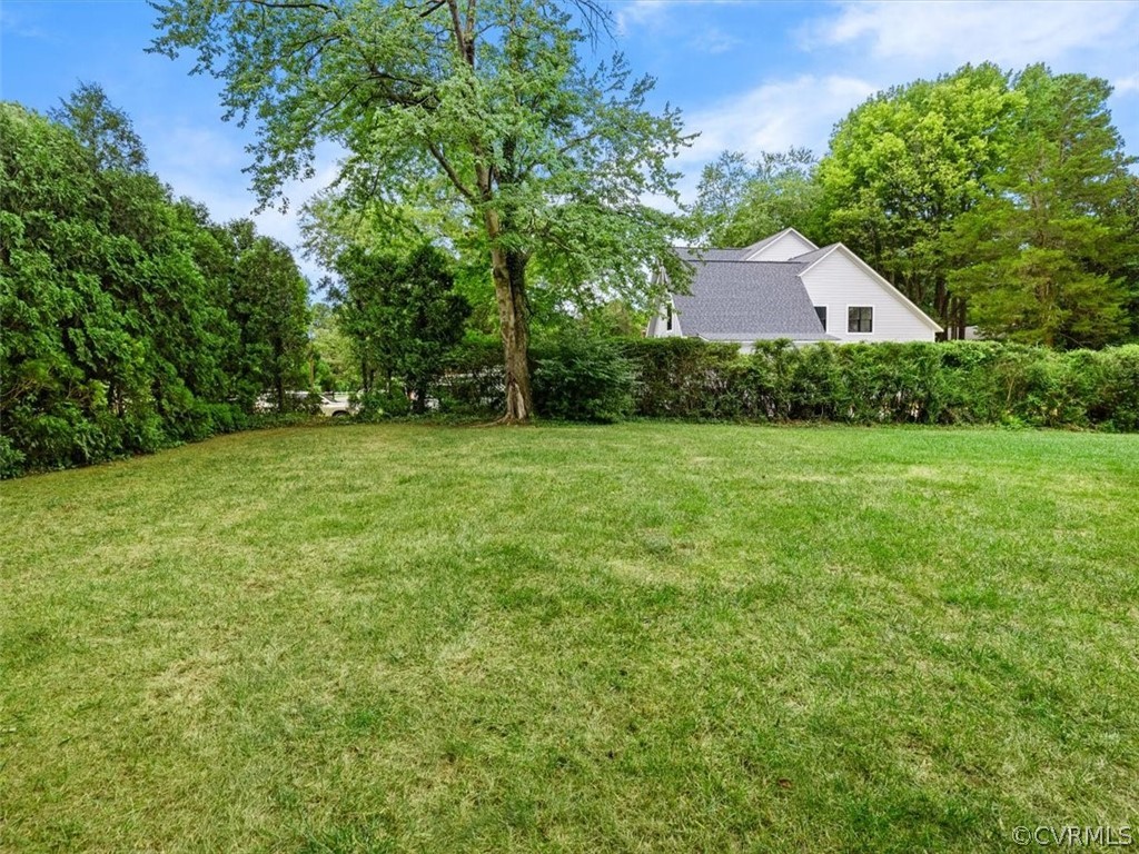 7100 River Road Henrico, VA 23229 - Photo 32 of 32 a front view of a house with a yard