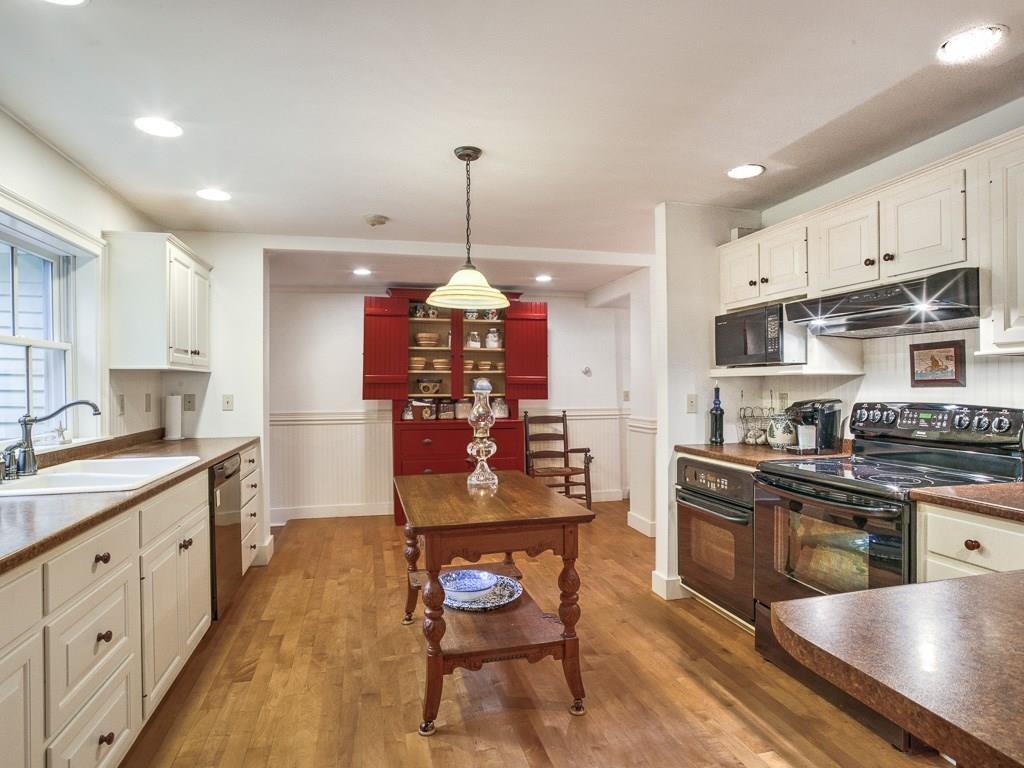 1135 Main Street Readfield, ME 04355 - Photo 15 of 33 Cooks Kitchen and the sink overlooks...