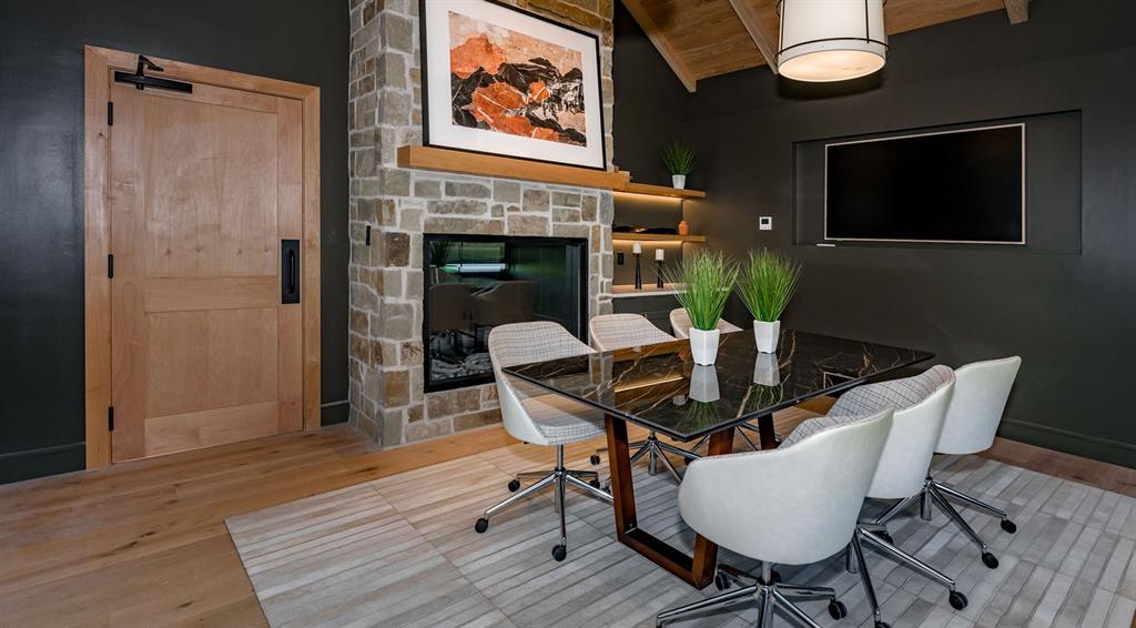 854 Stoney Bridge Way Lavon, TX 75166 - Photo 9 of 14 a view of a dining room with furniture and wooden floor