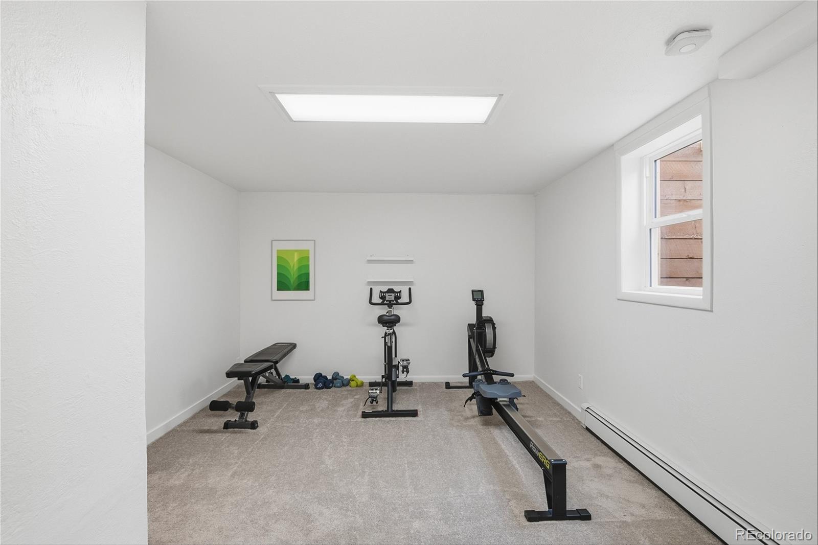 5974 South Pennsylvania Street Centennial, CO 80121 - Photo 21 of 46 a view of a room with gym equipment