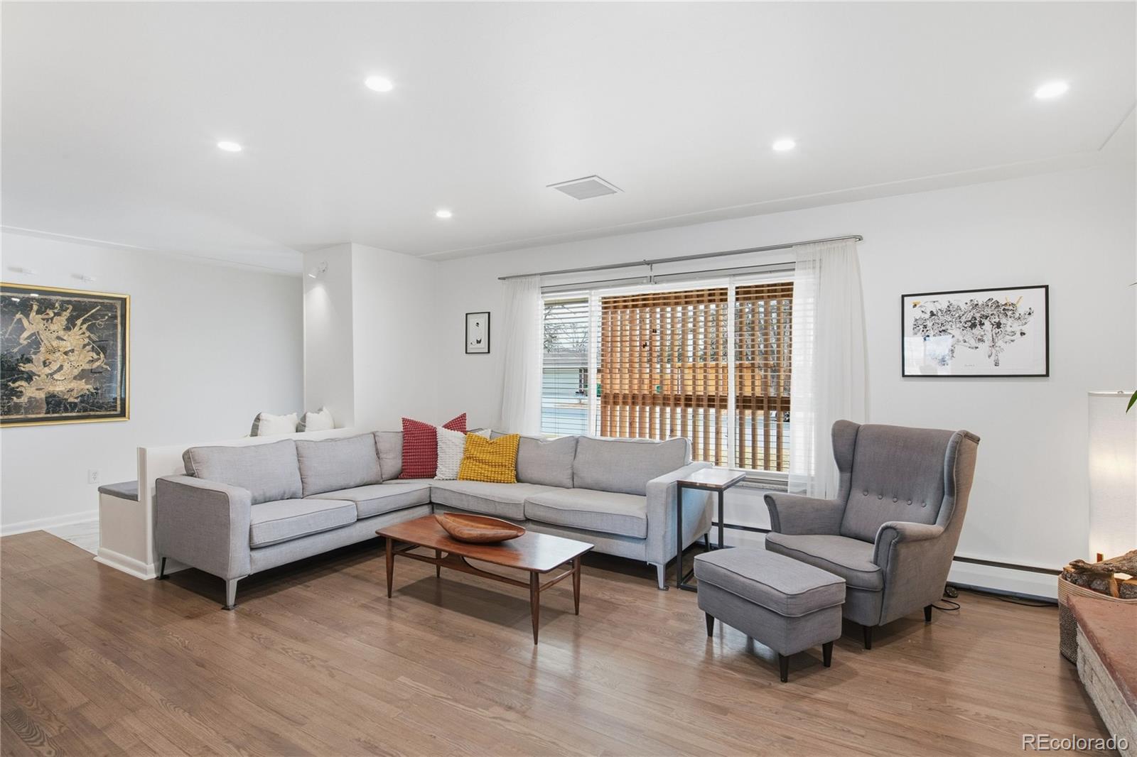 5974 South Pennsylvania Street Centennial, CO 80121 - Photo 5 of 46 a living room with furniture and a large window
