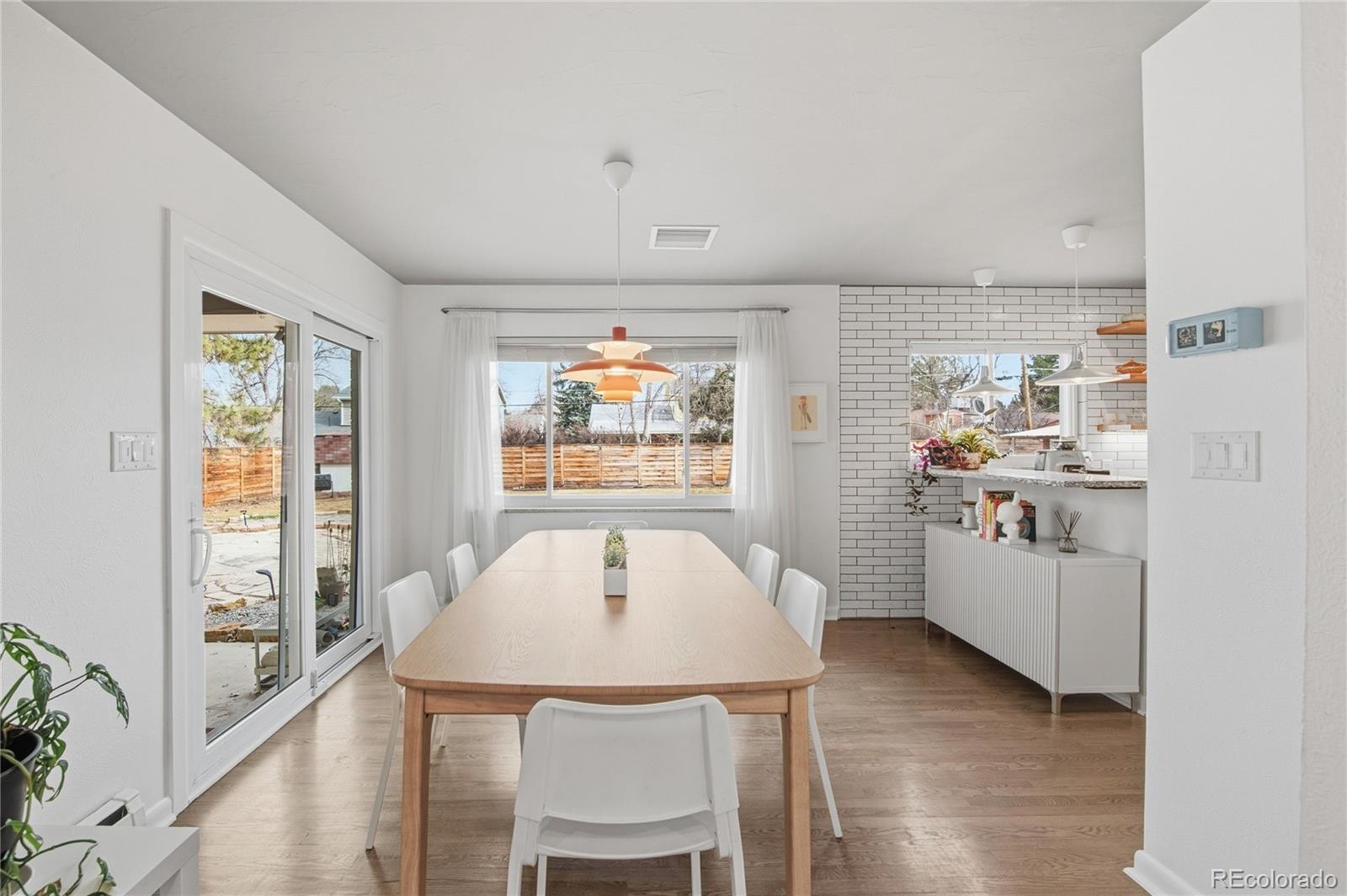 5974 South Pennsylvania Street Centennial, CO 80121 - Photo 7 of 46 a dining room with furniture and window