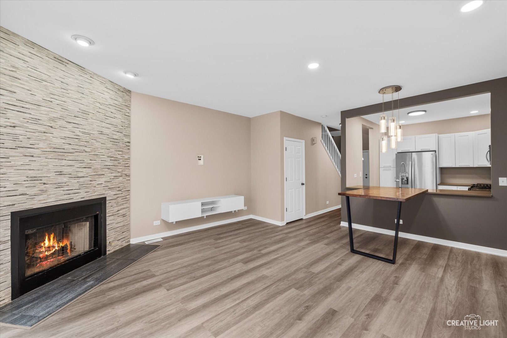 1935 Calla Drive Joliet, IL 60435 - Photo 7 of 17 a living room with furniture and a fireplace