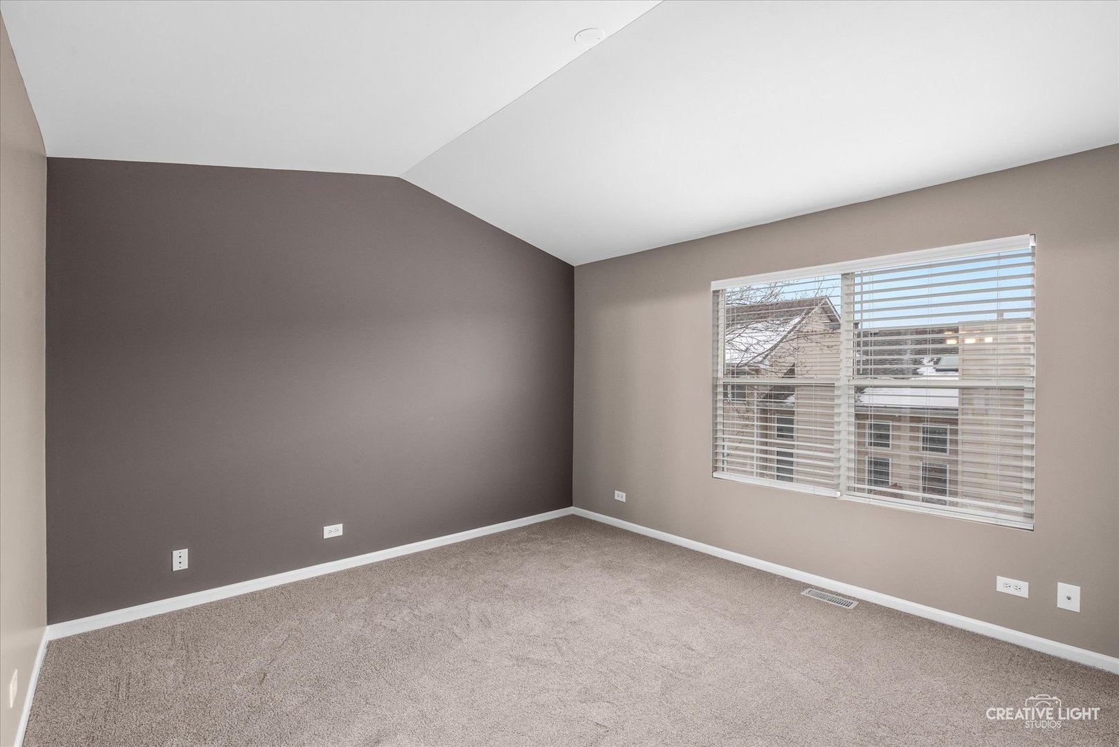 1935 Calla Drive Joliet, IL 60435 - Photo 8 of 17 a view of an empty room with a window