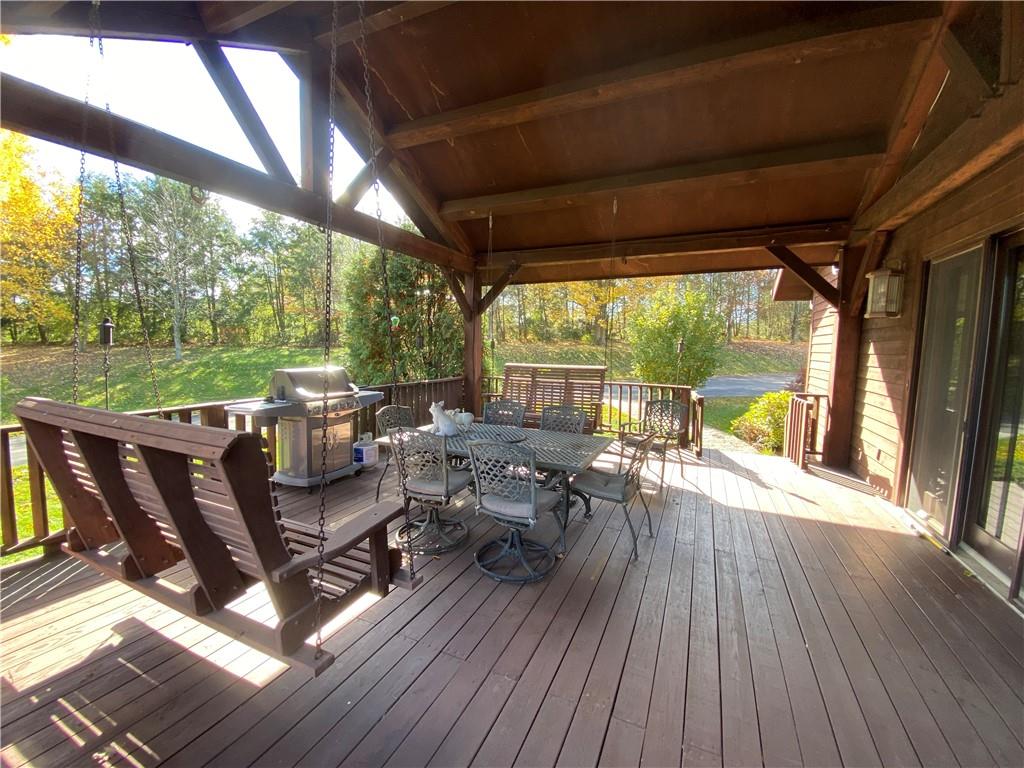 2862 West Pike Road Indiana, PA 15701 - Photo 23 of 25 a view of a patio with chairs and wooden floor