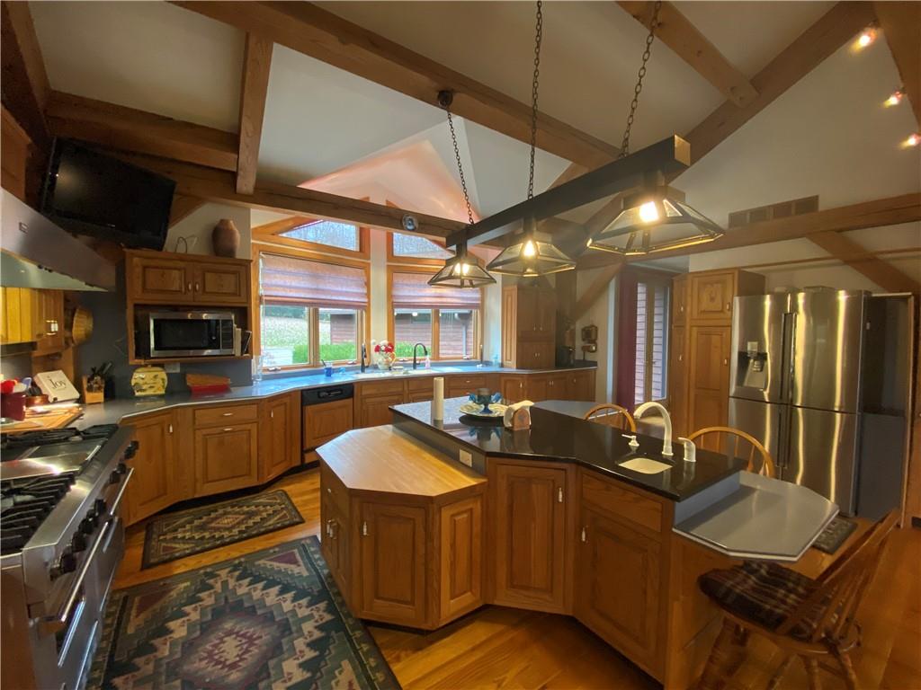 2862 West Pike Road Indiana, PA 15701 - Photo 8 of 25 a kitchen with granite countertop a sink and a stove
