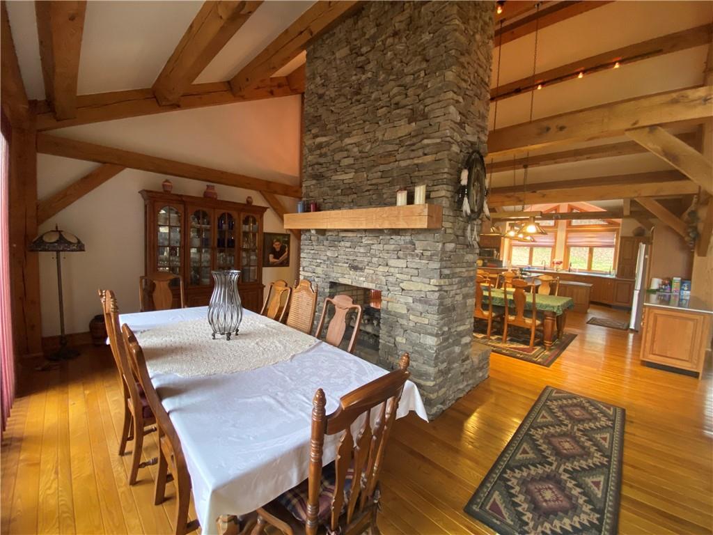 2862 West Pike Road Indiana, PA 15701 - Photo 10 of 25 a view of a dining room with furniture and wooden floor