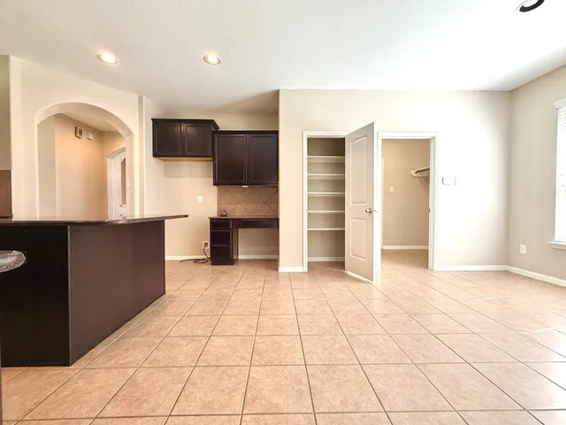 a view of a kitchen with a sink