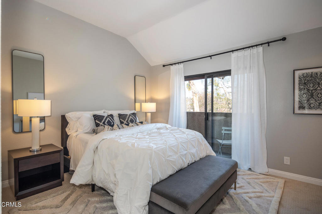 1035 Arroyo Verde Road, Unit B South Pasadena, CA 91030 - Photo 10 of 12 a bedroom with a bed and a lamp