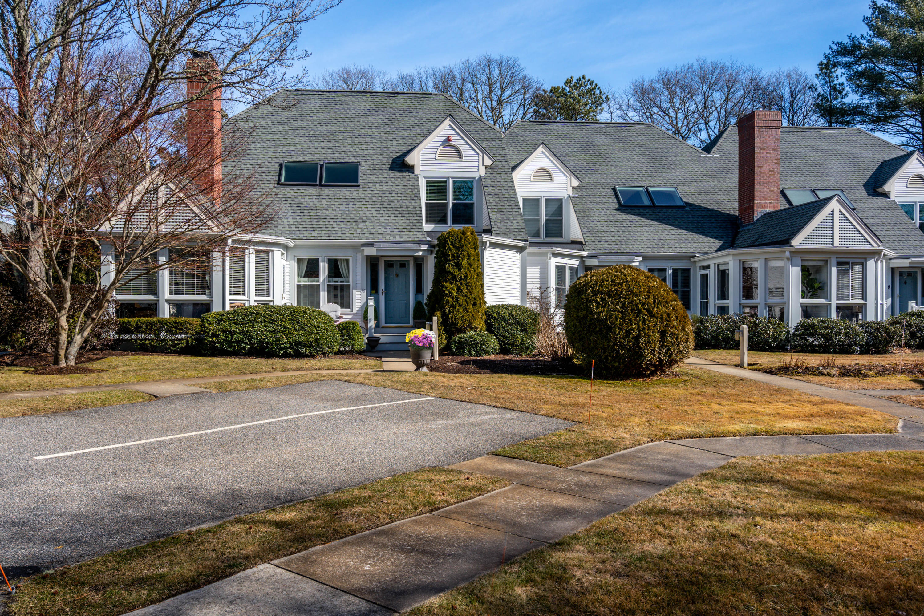 10 Bob White Crescent Mashpee, MA 02649 - Photo 28 of 28 a front view of a house with a garden