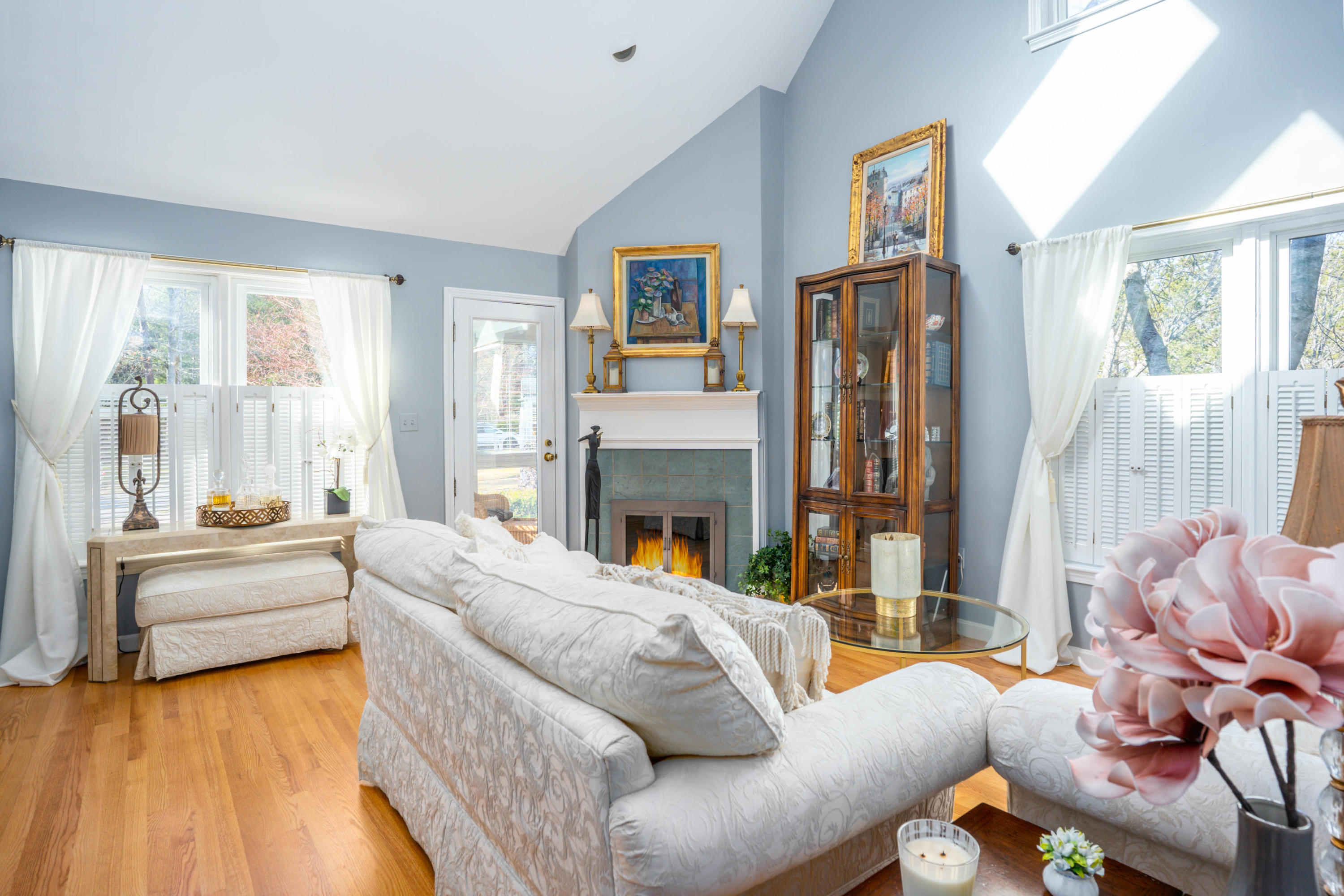 10 Bob White Crescent Mashpee, MA 02649 - Photo 6 of 28 a living room with furniture fireplace and a large window