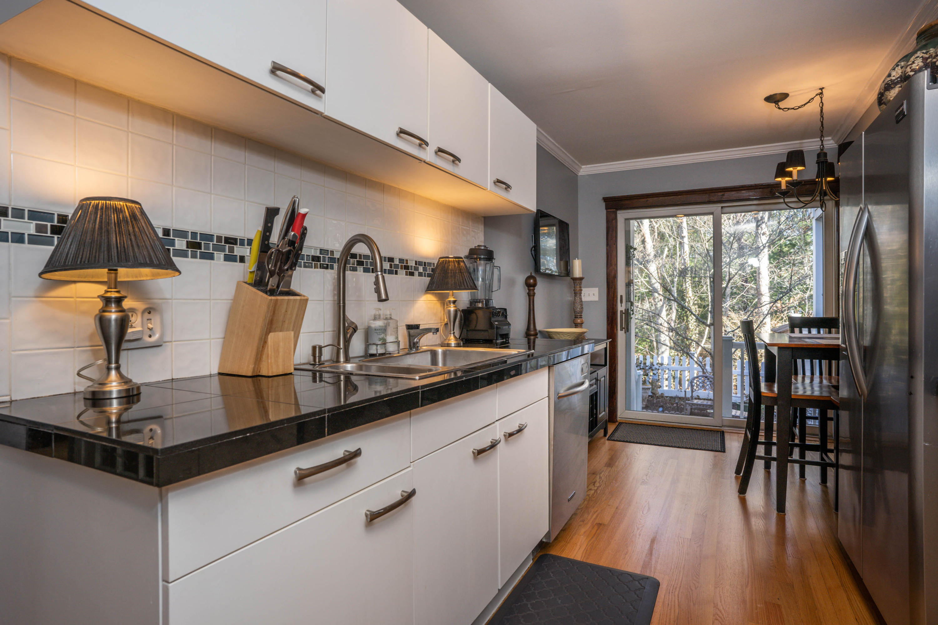 10 Bob White Crescent Mashpee, MA 02649 - Photo 10 of 28 a kitchen with stainless steel appliances granite countertop a stove and refrigerator