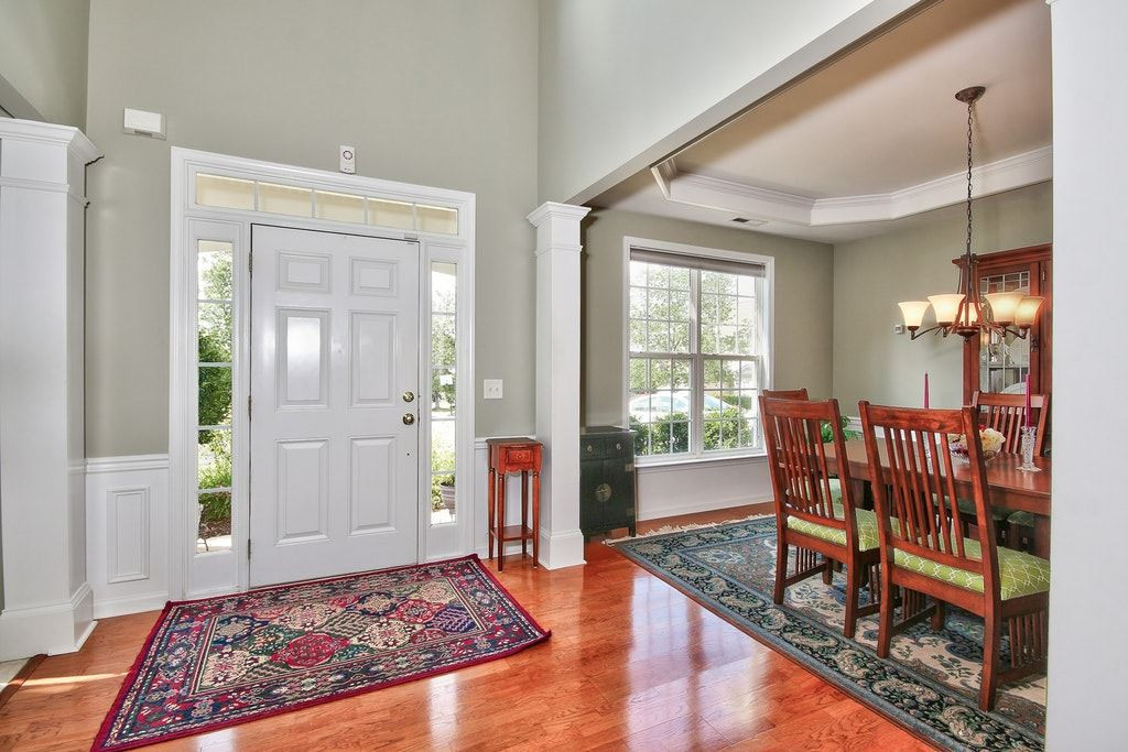 Grand foyer is inviting and welcoming with engineered hardwoods. Separate living room and dining rooms once you enter the home. The home is also already pre wired for security. Entry Foyer