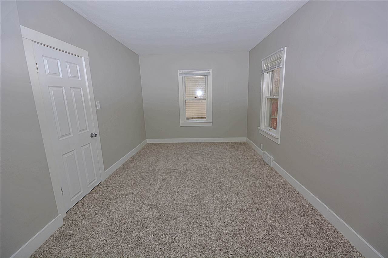 523 10th Avenue Rochelle, IL 61068 - Photo 16 of 22 a view of an empty room with a window