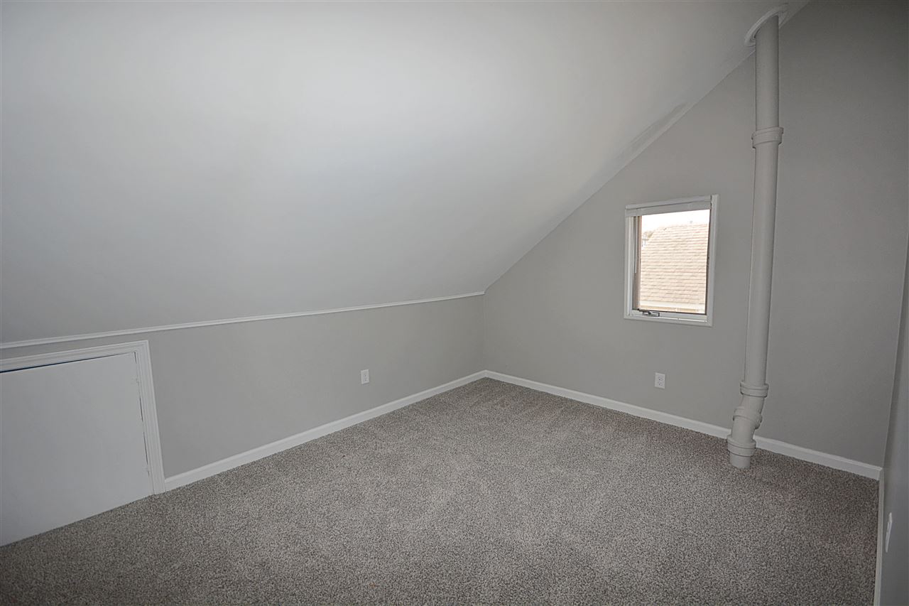523 10th Avenue Rochelle, IL 61068 - Photo 17 of 22 an empty room with a empty space and window