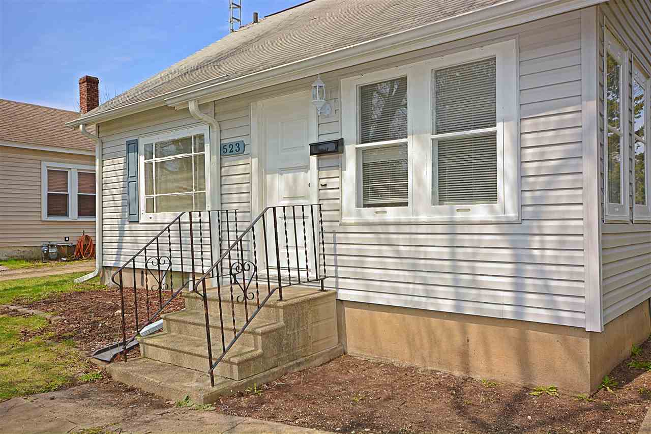 523 10th Avenue Rochelle, IL 61068 - Photo 2 of 22 a view of a house with a backyard
